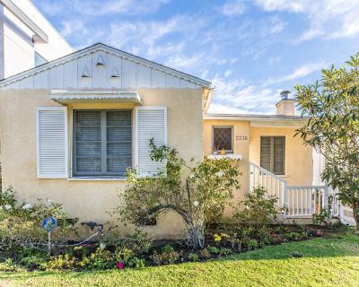 2230 Midvale Ave.. As you walk through this home, you are greeted with gleaming laminated wood floors and a decorative focal fireplace in the living room. The bathroom has a separate shower & tub and is equipped with Calcutta marble vanity countertop and flooring. The kitchen has granite counter tops and porcelain tile floors. Spacious front bedroom has a window seat overlooking the front yard ...