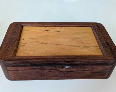 Made by Portland, Oregon artisan John M. Durum in various woods. Inside divider lifts out or can be used to organize earrings, rings and smaller items. 9 1/2"L x 5 1/2" W x 2 3/4" H. Check out the pictures at: