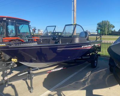 Condition: New, Make: Tracker, Model: Pro Guide V-16 SC, Year: 2023, Dealer: Cycle Zone, LLC, Phone: 785-234-3844. The price includes a trailer, a 90hp motor, and a cover. The TRACKER PRO GUIDE V-16 SC combines a wide-open cockpit layout with Deep V performance, creating an agile, easy-to-own package that will please any angler from the northern wilds to the sizzling south. Backed by the TRACKE...
