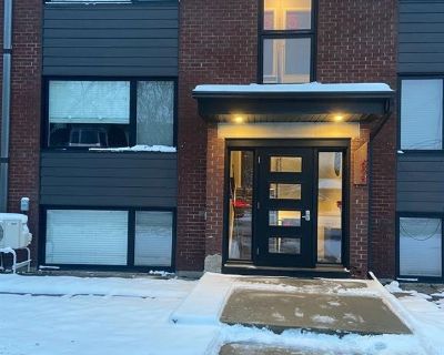 695 Morgan Street. Welcome to 695 Morgan Street Unit 5, a beautifully updated residence in Ottawa's desirable Castle Heights neighborhood. This spacious two-bedroom, one-bathroom apartment features hardwood flooring throughout the living areas, hallways, and bedrooms, creating a warm and stylish atmosphere. Enjoy a recently renovated kitchen, complete with modern stainless steel appliances and ...