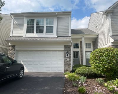 615 Hawley Drive. Beautiful town-home with a rare 2 story living room featuring huge windows overlooking a pond. Open floor plan flows into kitchen with Granite look Corian countertops, 42\" cabinets, upgraded Stainless Steel appliances (newer Microwave), hardwood flooring, even a pantry for extra storage. Dining area overlooks patio and the pond beyond. Second floor has spacious primary bedroo...