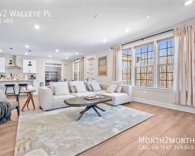 6242 Walleye Pl. Welcome to this exquisite three-story residence on Walleye Place! Designed to offer both sophistication and comfort, this stunning home features four spacious bedrooms, four and a half bathrooms, and two versatile office spaces perfect for modern living. The brand-new gourmet kitchen is a chef s dream, complete with sleek quartz countertops, custom cabinetry, and top-of-the-lin...