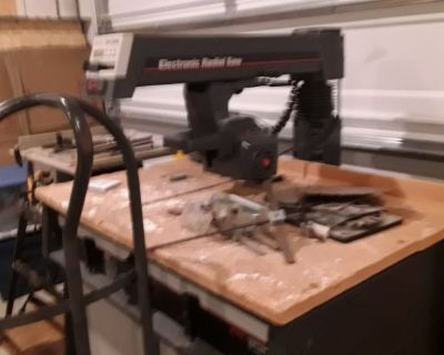 Craftsman 10" Electronic Radial Arm Saw and Ryobi 10" Table Saw with blades.