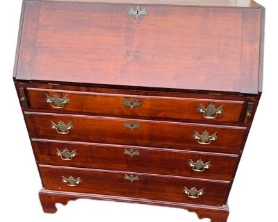 Handsome 18th century American Chippendale slant front desk. Desk is made of maple with pine secondary wood. Just in time to celebrate our upcoming birthday! This desk was here for the birth of our nation! Nice interior with several drawers and cubbyholes.. Desk is in very fine restored condition. Desk was refinished years ago in a nice warm color. The brass drawer pulls are historically correc...