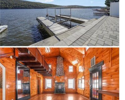 416 Jersey Ave. A True Greenwood Lake Retreat! Experience lakefront living at its best in this beautiful Cape on the sought-after west shore of Greenwood Lake. With breathtaking lake and mountain views from nearly every room, this home perfectly blends rustic charm with modern comfort. Step inside to an inviting all-pine interior where the cathedral-ceiling living room and stone fireplace creat...