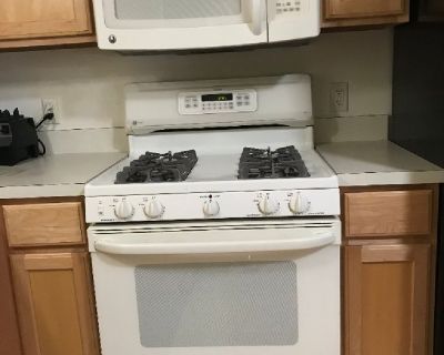 Gas stove and matching above range microwave with bracket