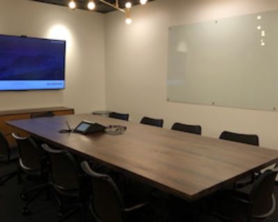 Meeting room. An enclosed, private office, located in an Industrious location. Fully-furnished with oak desks and Herman Miller chairs with access to premium services and amenities. Actual space not pictured.