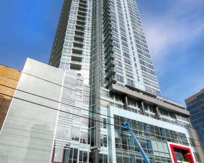 Downtown Spacious 1 Bed + Den + Flex Condo @ Capitol Residences