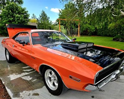 Odometer: 97000. Monster!! 1970 Dodge Challenger!! Resto Mod! 440 Magnum! All new electrical panels, New black front door panels, New door speakers, New park plugs w/ Ceramic boots. Black & Orange seats. Black carpet. 8Track works. Heat works. Car used to be blue interior so back seat door panels have been painted black. Custom paint in Tangerine w/ 3 colors of pearl mixed in. Sparkles yellow i...