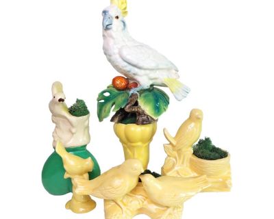 Striking curated collection of vintage ceramic birds and vases in yellow with accents of white and green, collected over 3 decades. Collection includes 5 ceramic birds and 2 ceramic vases. Birds on branch planters are from 1950's shown with moss in the planters, large white cockatiel is 1960's, smallest bird is 1980's. Vases used as pedestals are 1950's. All unmarked, some wear and patina. Larg...