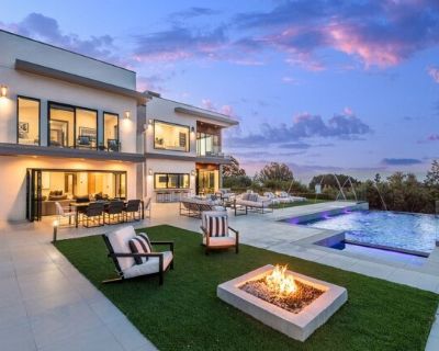 4338 Gayle Dr. Fully Furnished Contemporary Estate in Tarzana Move-In ReadyStep into sweeping panoramic views and refined design in this modern masterpiece at 4338 Gayle Dr, Tarzana, CA 91356. Nestled above the valley floor, this sleek two-story home offers approximately 4,300 sq ft of living space on a 0.44-acre lot, built in 2017. Eckhoff+3Featuring 6 bedrooms and 5 baths, this residence is o...