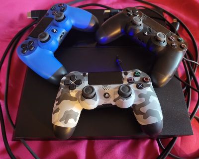PlayStation 4 with 3 controllers