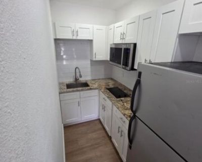 1614 N Washington Ave. Fully renovated 3/2 with a private third-bedroom suite with separate entrance and kitchen, ideal for multigenerational living. Wood-look porcelain tile, updated baths, quartz countertops, and a large yard. Location: near Clearwater Beach and a short drive to Downtown Dunedin. Section 8 vouchers welcome.. 3 Bedroom. 2 Bathroom. 1372 ft