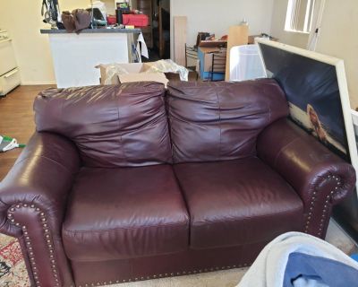 Leather love seat and couch.