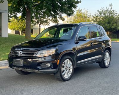 Mileage: 89,000. Year: 2013. Make: Volkswagen. Model: Tiguan. Trim: 2.0T SE Sport Utility 4D. Auto, 6-Spd DSG w/Tptrnc transmission. Interior: 4-Cyl Turbo 2.0 Liter, Dual Air Bags, Power Windows, Heated Seats, Tilt & Telescoping Wheel, Power Door Locks, Hill Hold Assist Control, Alloy Wheels, AM/FM Stereo, Daytime Running Lights, Side Air Bags, Dual Power Seats, Rollover Protection, Keyless Ent...