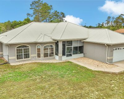 SW 41st Ct. Refined living on a rare -acre cul-de-sac lot. This beautifully upgraded 4-bed, 2-bath Evergreen model offers a chef s kitchen with granite countertops, stainless steel appliances, and shaker cabinetry. Tile and wood flooring flow throughout. The oversized primary suite features a spa-style bath with Roman tub and dual vanities. Enjoy flexible living with a bonus room ideal for an o...