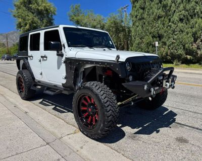 2014 Jeep Wrangler Unlimited Sport SUV 4D
