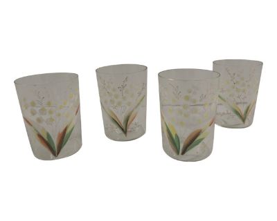 Vintage White and Yellow "Lily of the valley" Hand-painted Juice Glasses - Set of 4 Faded gold rim Very fragile Hand-blown. Size: 2.75"W x 3.75"H. Dimensions 2.75 W 2.75 D 3.75 H Styles French Country Period 1980s Country of Origin France Item Type Vintage, Antique or Pre-owned Shop Sustainably with Chairish Materials Blown Glass Condition Good Condition, Original Condition Unaltered, Some Impe...
