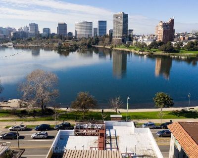 2208 Lakeshore Avenue. Experience the best of Lakeshore living in this spacious, light-filled top-floor apartment overlooking beautiful Lake Merritt. This large 2-bedroom, 2-bath home features expansive windows framing stunning lake views, generous living and dining areas, and an original fireplace that adds warmth and charm. The residence has been freshly updated with brand-new flooring throug...