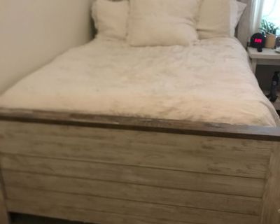 White wooden bed frame