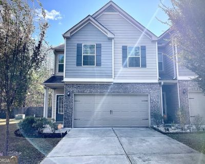 7831 Rock Rose Ln. Welcome to this stunning 4-bedroom, 2.5-bathroom townhome located in the vibrant community of Fairburn, GA. This corner unit boasts an open concept design that allows natural light to flow seamlessly throughout the home, enhancing the warmth and inviting atmosphere. The kitchen is a chef's dream, complete with full stainless appliances, a functional island, and granite counte...