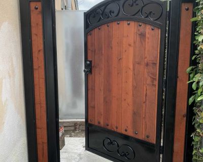 Wrought iron and wood gates