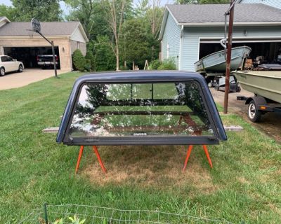 Swiss Fiberglass Truck Cap with sliding windows for a 6ft 6 inches bed length.