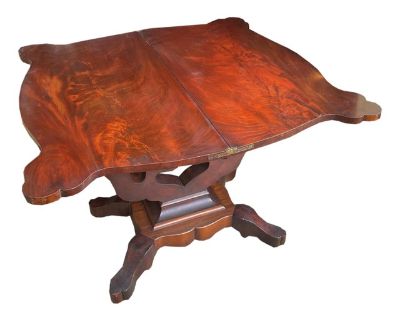 Large crotch mahogany Empire style(1800s) flip-top game table top swivels to reveal a space for your favorite board or card games. See pics for some typical veneer loss. So elegant it hurts. When collapsed: 35 inches deep 34 inches wide 29.25 inches tall.. Dimensions 35 W 34 D 29.25 H Styles Empire Victorian Table Shape Other (unique shapes) Period Early 19th Century Country of Origin United St...
