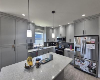 Spacious 4-BR Home with Solar Panels & Large Fenced Yard