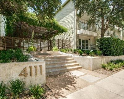 4111 Cole Ave Apt 28. Contemporary condo in gated community across from Cole Park and blocks from Knox-Henderson, West Village and the Katy Trail! Beautiful two bedroom CORNER unit with tons of windows, TWO balconies with multi-door access, private garage and community pool with spa! Tons of natural light and wood burning fireplace in the living room with balcony patio. Bright galley kitchen wi...