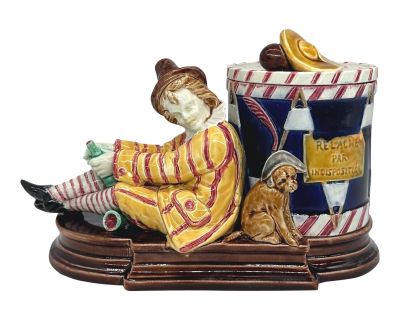 A Sarreguemines Majolica Smoking Stand, Drunk Street Musician and Dog, Ca. 1880