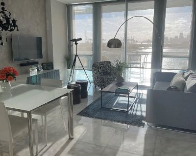 Lease term: Month to Month. $3500/month 1 Month Security Deposit. Furnished Rental. Beautiful and impeccable waterfront condo w/ the most breathtaking wide open bay/waterview and Miami Skyline view. White marble floors thru out and tastefully furnished. Move right in and enjoy the sunset every night.. Parking High Speed internet Pets OK Cable Air conditioning Handicapped access Smoker OK Elevat...