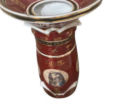 The vase features Egyptian hieroglyphs and a depiction of the pharaoh Tutankhamun's mask. It is made of fine porcelain with a gold trim. The text "Egypt" is written in gold script on the side of the vase. Pickup Details Three Day Pickup (BY APPT ONLY): Fri., November 14th ~ 10:00 a.m. - 6:00 p.m. Sat, November 15th ~ 10:00 a.m. - 6:00 p.m. Sun., November 16th ~ 10:00 a.m. - 6:00 p.m. Preview (B...