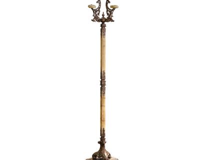 This antique carved onyx and brass hall tree was crafted in France, circa 1920. Standing on an intricate triangular molded base ending with paw feet, the tall rack features a square central marble stem decorated with dolphin-form umbrella or belt hooks at center join. The top embellished with a decorative central finial, is dressed with a swivel four scrolled shell form arms terminating in doub...
