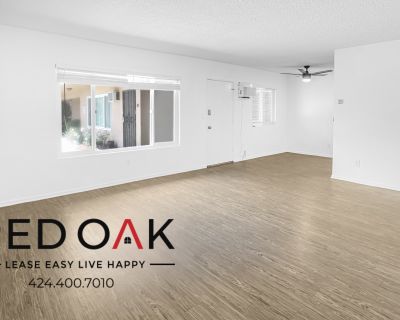 Lovely, Bright, and Sunny Two Bedroom With Tons Of Natural Light, Stainless-Steel Appliances, Custom built-ins, Wall-Mounted A/C, PARKING and ON-SITE LAUNDRY INCLUDED! In Prime Anaheim!
