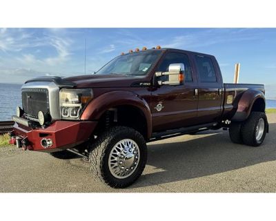 Odometer: 45889. This 2016 Ford F-450 Super Duty is powered by a Power Stroke 6.7L turbo diesel V8mated to a six-speed SelectShift automatictransmission and dual-range transfer case. Finished in maroonover a brown leather interior, this four-wheel-drive duallyis now offered by the selling dealer with a clean AutoCheck report and a clear title.