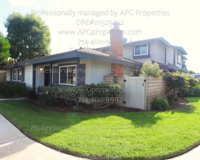 8229 Woodland Dr. 3 Bedroom / 2 Bathroom Condo with 2 car garage in Buena Park APG Properties - DRE#01525202 Single story - end unit condo New interior paint Wood and tile flooring throughout - no carpet Recessed lighting Spacious living room with a decorative brick fireplace *Fireplace is non-operational Kitchen features stone counters, bar seating, and a pantry Refrigerator is included Adjace...