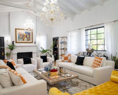 Alton Rd. Exquisitely completely renovated with no expense spared, this historically significant 1934 Mediterranean Revival by Carlos Schoppel offers gorgeous interior design tasteful luxury on an oversized lot. The home s elegant interiors feature soaring wood-beamed ceilings grand entertaining spaces filled with natural light. Chef s kitchen includes top-tier appliances, marble waterfall isla...