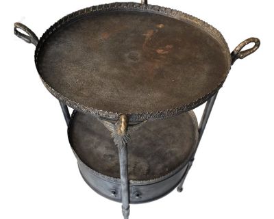 19th Century French Regency Two Tier dark silver metal round side table having galleried toop (removable for shipping) and lower tier shelf as well a 2 small doors with interior storage.. Dimensions 24 W 19 D 30 H Styles French Regency Table Shape Round Period Late 19th Century Country of Origin France Item Type Vintage, Antique or Pre-owned Shop Sustainably with Chairish Materials Gun Metal Fi...