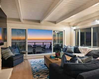 1680 N Neptune Ave. Experience the ultimate beach getaway in this luxurious four-bedroom, three-bathroom single-level home. Perfect for large groups, two rooms feature comfortable bunk beds, allowing the house to sleep 10 guests comfortably. Enjoy the breathtaking ocean views from the expansive private deck, which is an entertainer's paradise. The deck boasts a soothing hot tub, a stylish outdo...