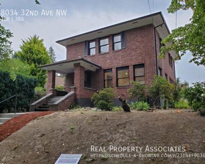 8034 32nd Ave NW. Welcome to this beautifully renovated 3-bedroom, 3.5-bathroom home, offering 3,110 square feet of stylish and functional living space in the heart of Ballard. This home exudes character and charm, featuring gorgeous oak hardwood floors, a formal entry with a grand staircase, and stunning stained glass windows that add a unique touch. The spacious living room opens seamlessly i...