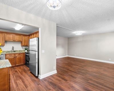 Normandy P. Bright Spacious 2 Bd/ 2 Bath Upgraded 1st Floor MOVE-IN READY Condo, Located Right Across Street From The Clubhouse! Beautiful Maple Kitchen cabinets w/Granite Counters New stainless steel appliances add'l Servers cabinet! Brand NEW CRYSTAL Chandeliers in Dining Living Rms; NEW CEILING FAN/lights in both Bedrooms, Both Bathrooms are Upgraded, Wood Laminate Flooring; Glassed FLORIDA ...