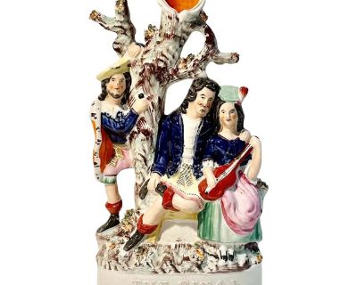 A beautifully modeled and unusually well preserved Staffordshire spill vase from the 19th century titled The Reveal. This piece captures a charming figural tableau with expressive detail and a graceful form typical of Victorian era Staffordshire pottery. Originally designed to hold tapers or spills near a hearth this piece now stands as a sculptural decorative accent full of character and histo...