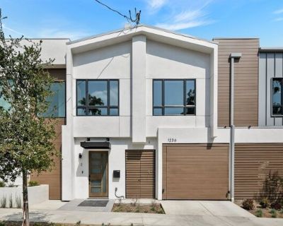 1236 N Spaulding Ave Apt 2. Enjoy a newly-constructed and modern townhouse in a central West Hollywood location. Walk through the front door and head up the stairs to the living space. Relax on the couch and put your drink down on the coffee table all watch your favorite streaming services and local channels on the flat-screened Smart TV. Cook a meal in the large kitchen with brand-new stainles...