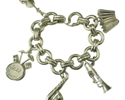 Late 20th Century Tiffany & Co. Sterling Silver Jazz Instrument Charm Bracelet