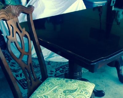 Formal Dark Cherry Dining Table and 6 Chairs with 2 of them being armed chairs