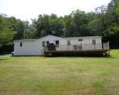 .56 Acres with 2 well-kept mobile homes