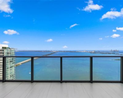 NE 31st St. Turnkey, 14 feet ceiling high, furnished penthouse showcasing 3-bedrooms/ 3.5 bathrooms. Enjoy incredible bay views and Miami Beach skyline from an expansive terrace with a private outdoor jacuzzi. This totally remodeled unit boasts 14' ceilings, Italian furniture, custom walk-in closets, solid doors and electric shades. The kitchen features a beveled finish countertop and full Quar...