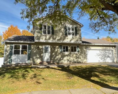 1309 Monmouth Avenue. Charming 3 bedrooms, 1.5 bathrooms, finished basement and large yard with huge brick paver patio! The entire house is to be painted to neutral color; hallway bathroom and powder room are in the process of remodeling! Step onto the welcoming 27'x13' front brick paver patio and into the bright, open floor plan, highlighted by soaring vaulted ceilings, luxury vinyl plank floo...