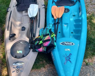 Pair of kayaks! Tan one has places 4 fishing rods